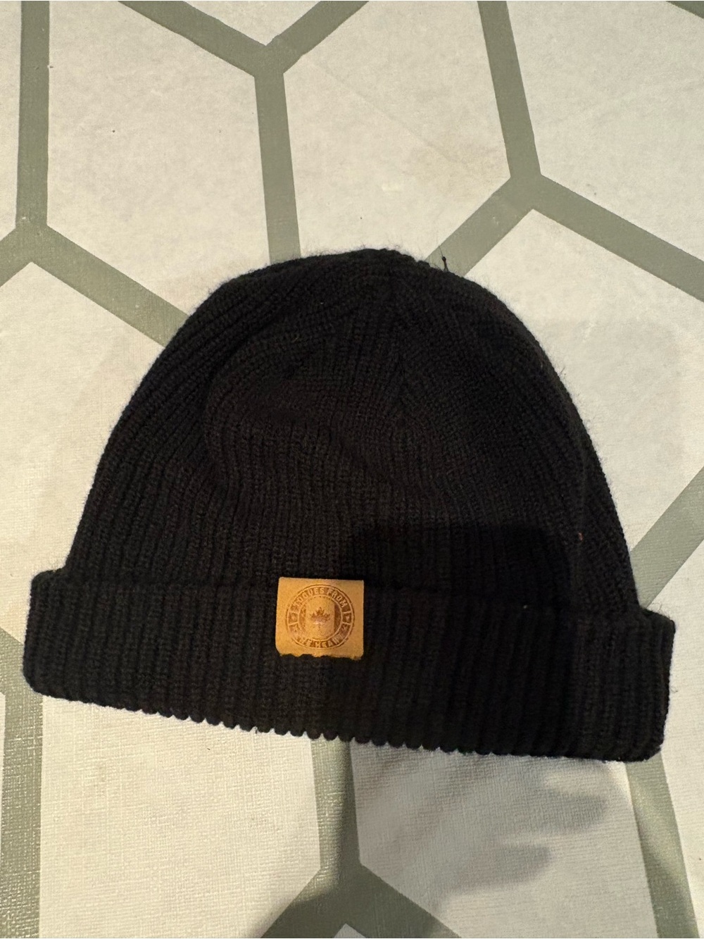3/15$ Black Knit Beanie with Leather Patch -